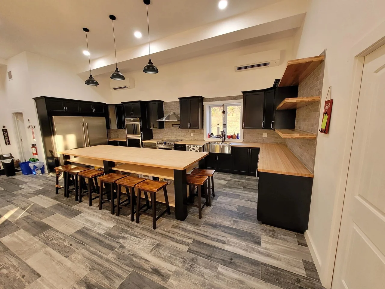 Dark kitchen cabinets with warm wood surfaces
