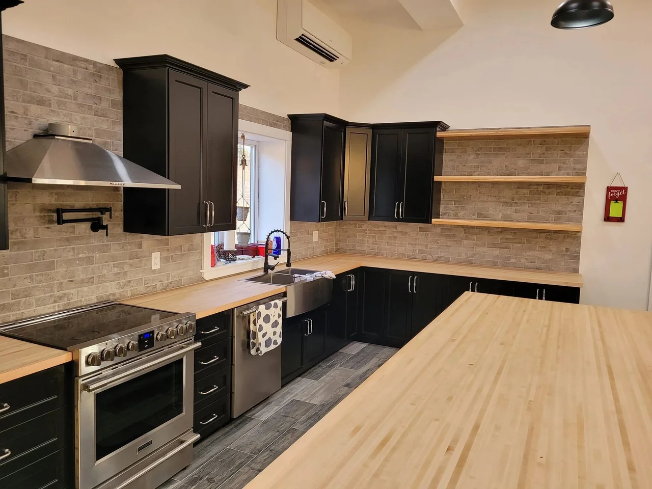 Kitchen storage with a brick backsplash