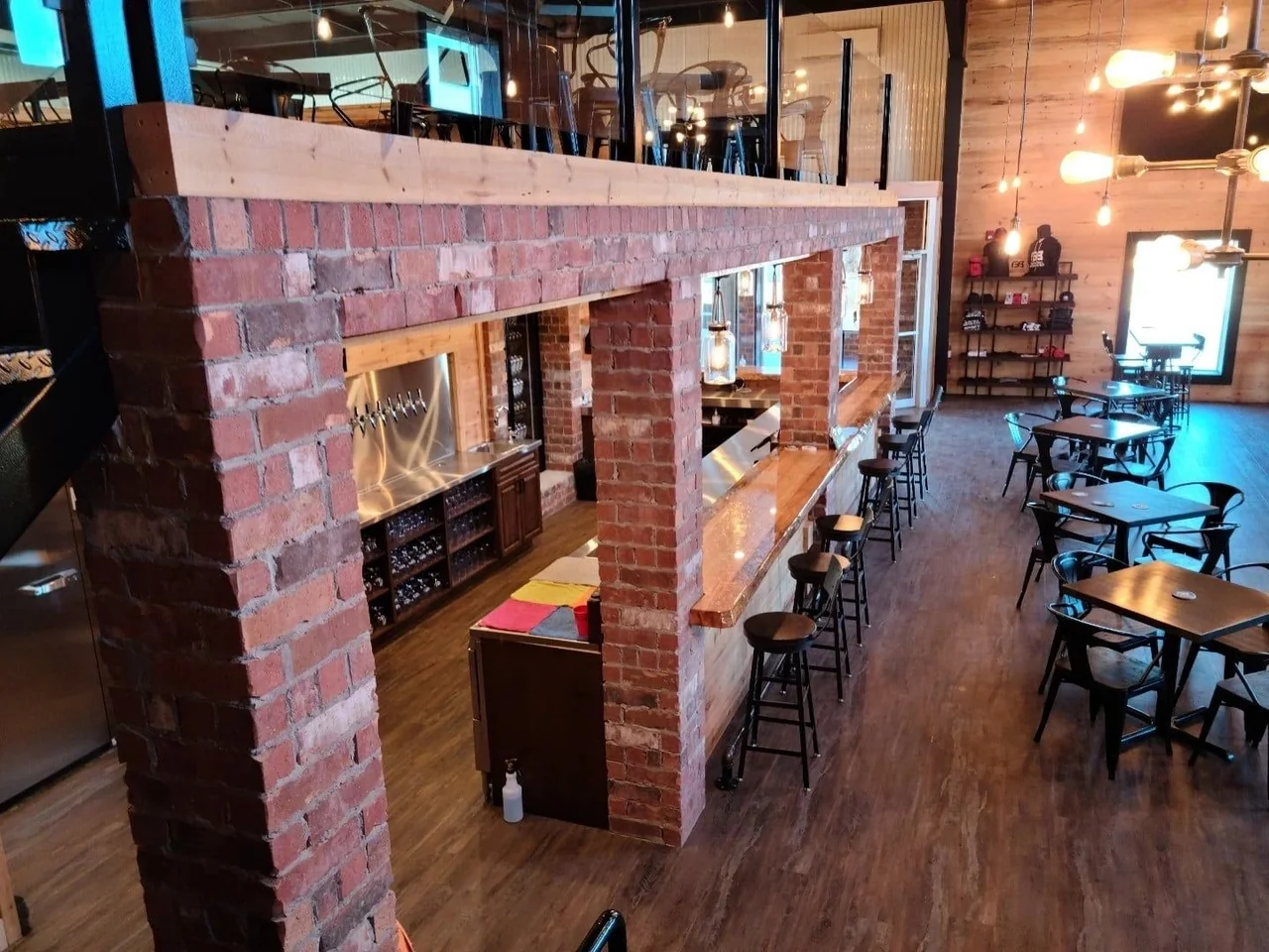 Built-in bar storage framed by brickwork