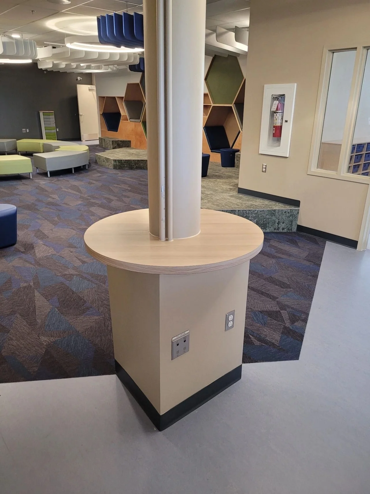 Curved cabinetry fitted around an interior column