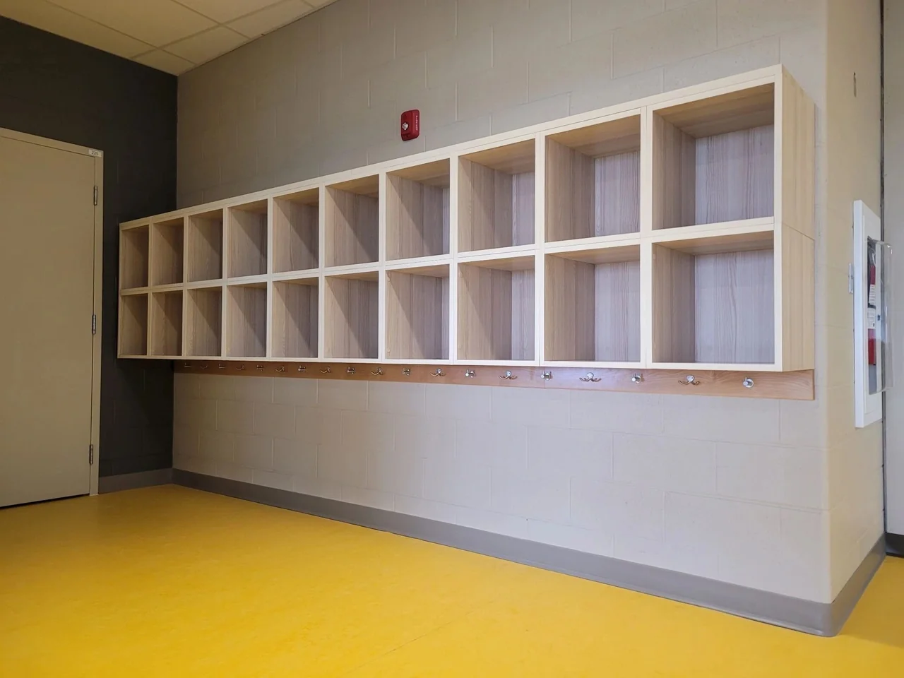 A wall of custom open storage cubbies