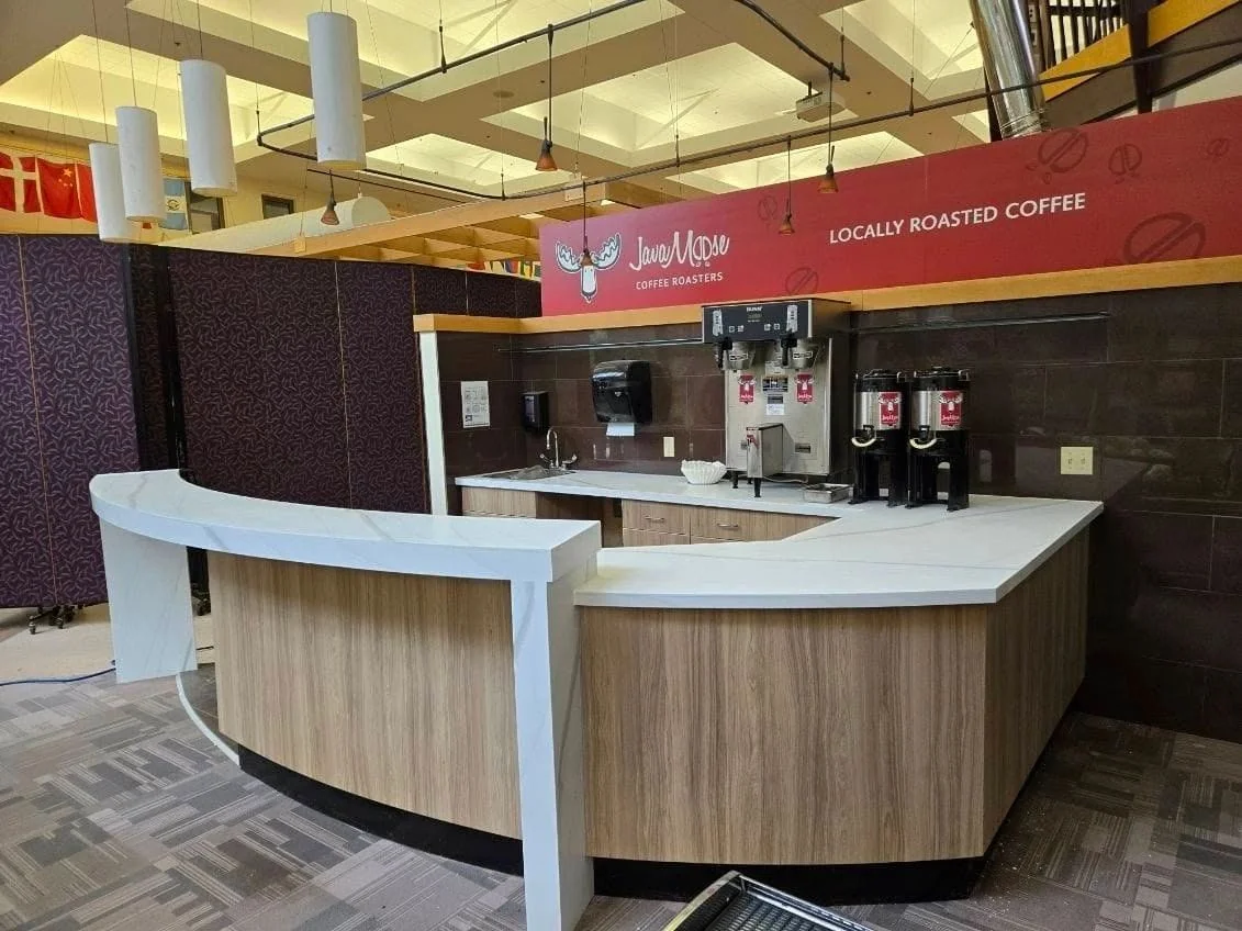 Curved service counter with wood detailing